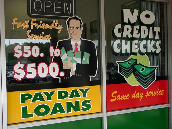 Policymakers are proposing plans to cut the demand for payday loans charging exorbitantly high interest rates. Taber Andrew Bain/CC BY 2.0/Flickr